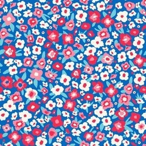 Firework floral with red, cream, and light aqua teal on cobalt blue background | 6in