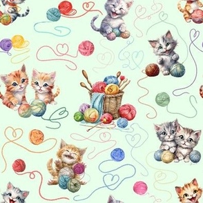 Playful Kittens Love Yarn on Green