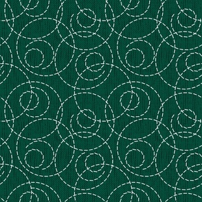 White dotted pattern with circles on a green background.