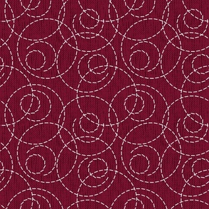 White dotted pattern with circles on a dark red background.
