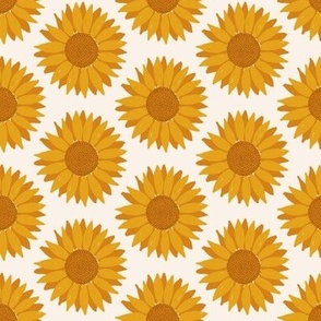 Bright golden yellow sunflowers on ivory