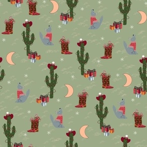 Natural Christmas - Desert Scene sage green bkg w/Cowgirl boots with flowers, howling coyotes and decorated cacti