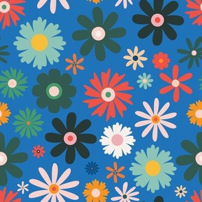 Medium - bright colorful busy modern retro floral design in blue  with red, yellow, green and white