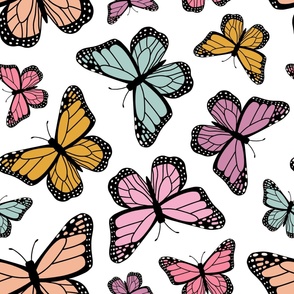 Colorful Butterflies - large scale multi-colored butterflies scattered on a white background 