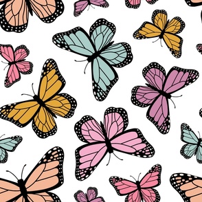 Colorful Butterflies - small scale multi-colored butterflies scattered on a white background 
