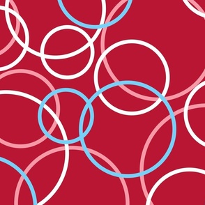 Blue, Pink and White Circles on Red Background