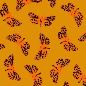 Scattered Butterflies_orange and black on caramel