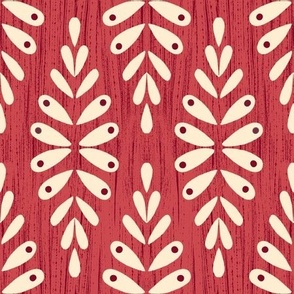 Scandi leaves in white on textured red background