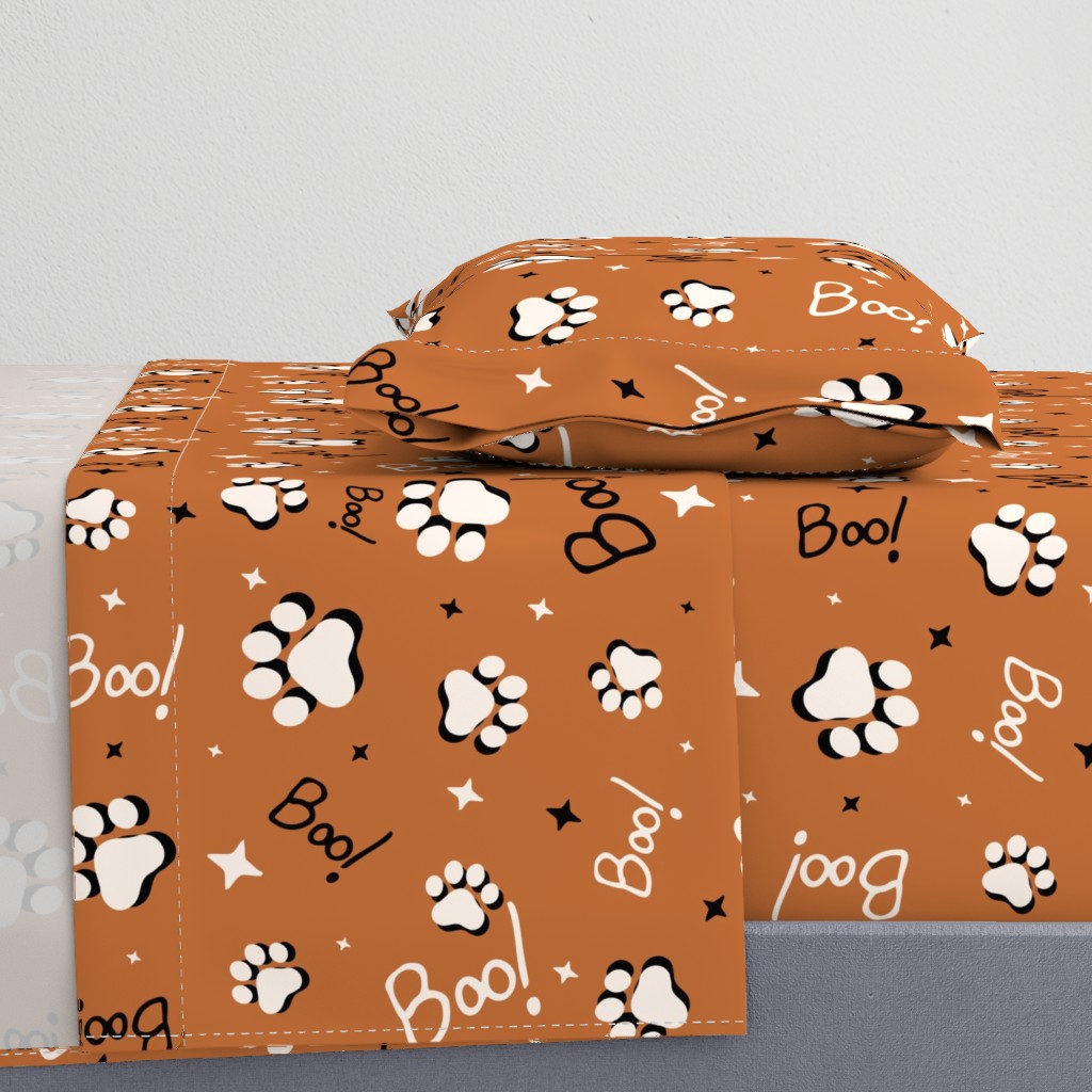 Cute Spooky Halloween Cat Paws tossed with Boo and stars in burnt orange