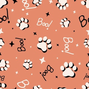 Cute Halloween Cat Paws tossed with Boo! and stars in peach for quilting and kids