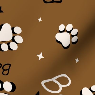 Cute Spooky Halloween Cat Paws tossed with Boo and stars in chocolate brown