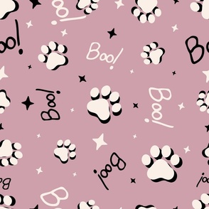 Cute Halloween Cat Paws tossed with Boo! and stars in lilac pink for quilting and kids