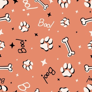 Cute Halloween Dog Paws tossed with Boo! and stars in peach for quilting and kids