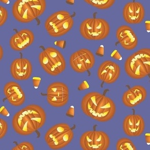 Tossed Scary Halloween Pumpkins on Green Ground Medium Scale