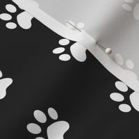 simple white cat paw prints on black 