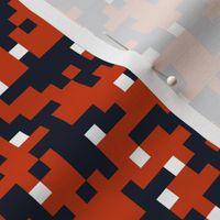 Pixelated camouflage blocks in dark navy 0b162a, orange toned c83803, white school spirit team colors Small