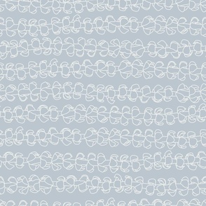 Horizontal Puakenikeni lei outline gray cabinet match