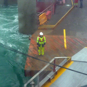 Jersey Island Ferry Dock and Worker