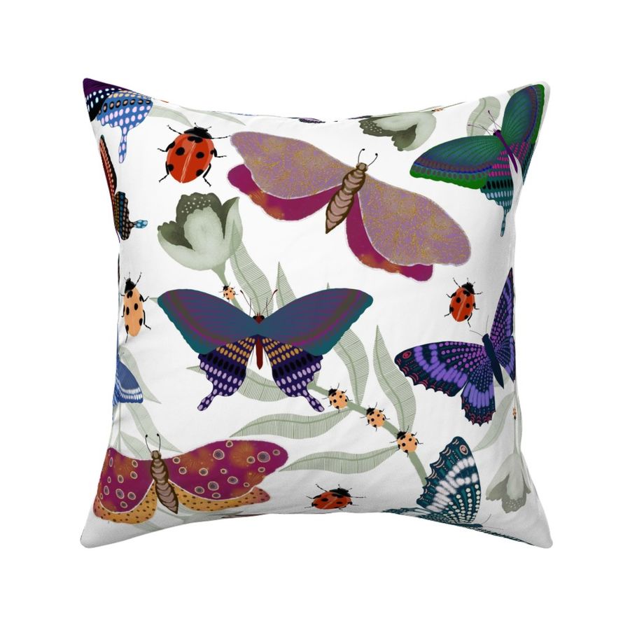 Loaded with butterflies and lady bugs on whimsical leaves white background