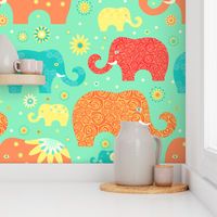 Elephants in vacation. floral elephnts on green background