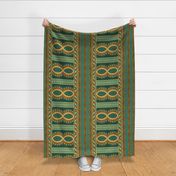 Large 24” repeat geometric refined bohemian vertical  border design with figure of eight, stripes and circles and jewel-like effect tesserae  with Aztec overtones with faux woven burlap texture in paler greens, teal, orange and gold