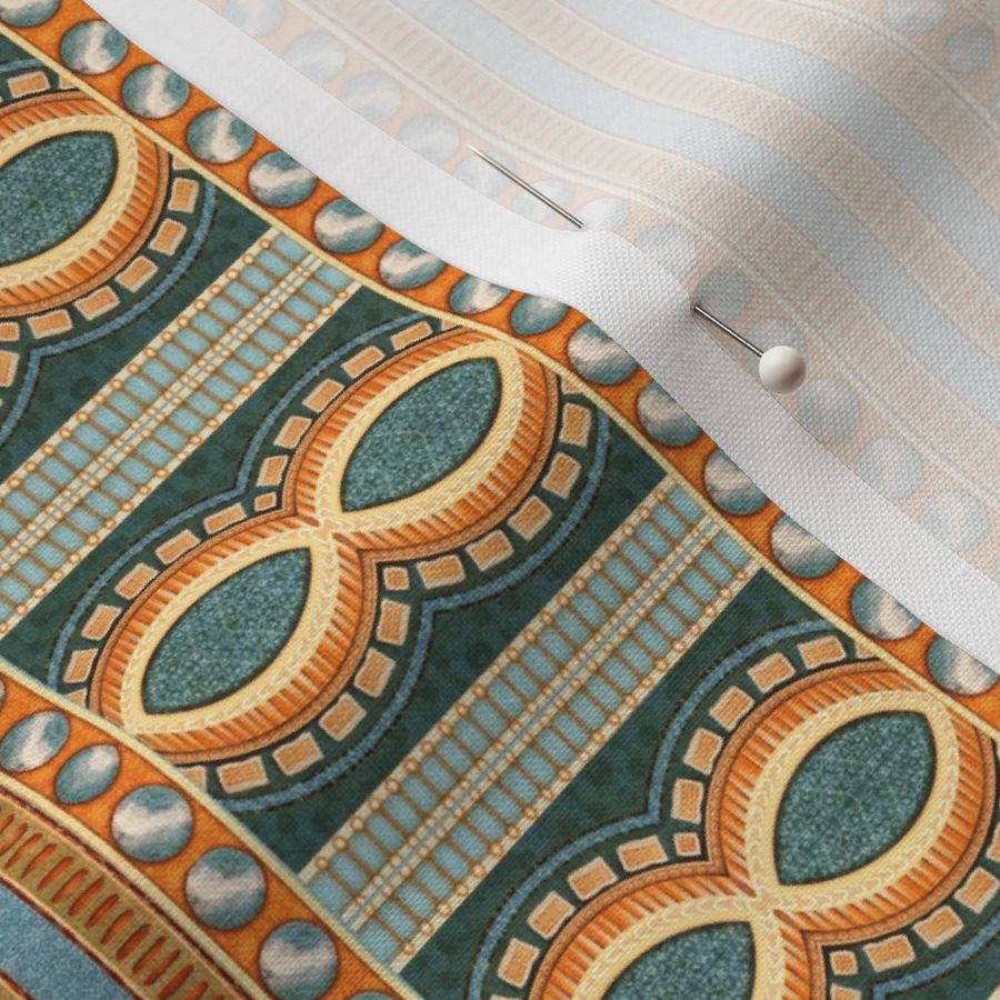 Very small 4” repeat geometric refined bohemian vertical  border design with figure of eight, stripes and circles and jewel-like effect tesserae  with Aztec overtones with faux woven burlap texture in summer blues, orange, silver and turquoise.