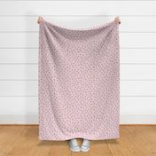 Small irregular textured polka dots in soft pink amethyst blush