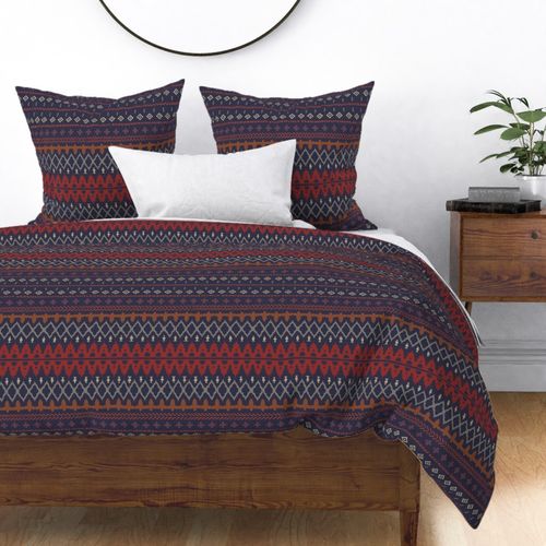 Rustic geometric tribal pattern in earthy tones (L navy blue & burnt umber