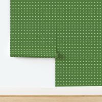 Minimalist cream white Mini Floral Motif dots on kelly green background