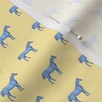 Little Blue Horse on yellow background