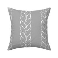 Braid pattern. White ornament on light gray background.