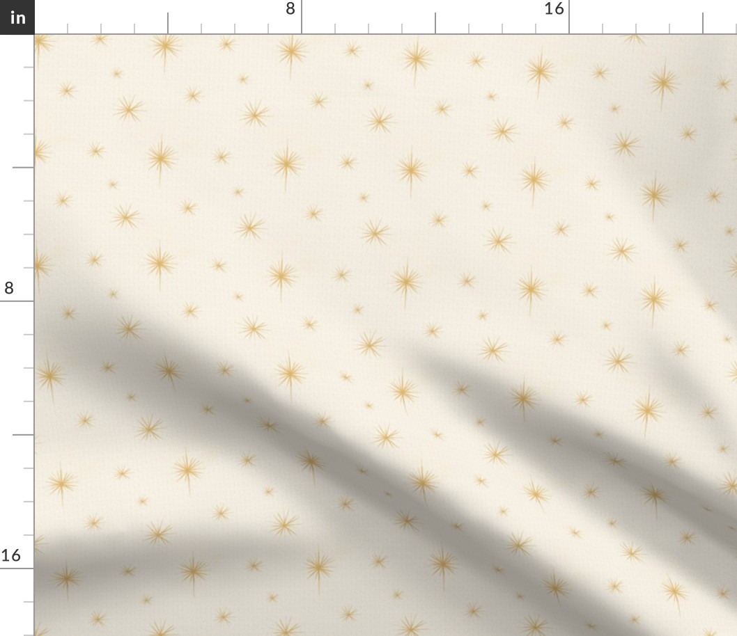 Small golden light star pattern with neutral background