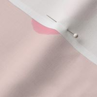 Pink dots on rose colored background