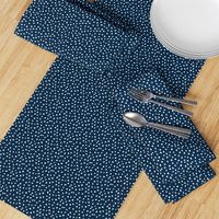 Dalmation Dots white on navy  fabric at 50%