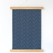 Dalmation Dots white on navy  fabric at 50%