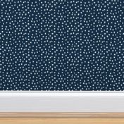 Dalmation Dots white on navy  fabric at 50%