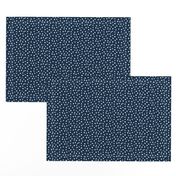 Dalmation Dots white on navy  fabric at 50%