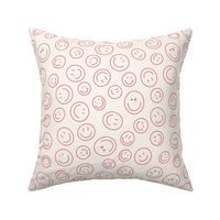 Cute earth tone dusky pink tossed smileys and winky faces on cream S