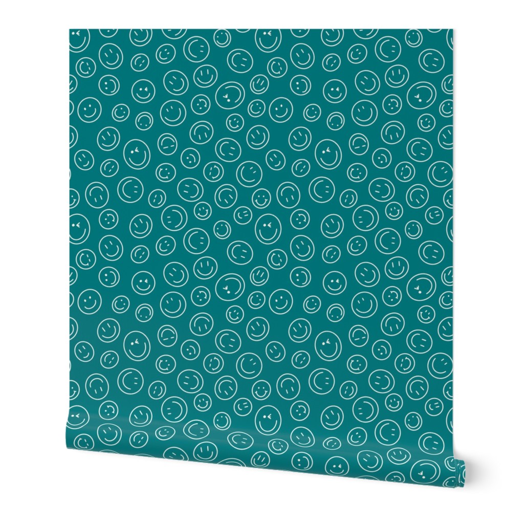 Cute cream tossed smileys and winky faces on teal green small