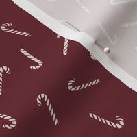 Tossed Candy Canes on deep Red Cabernet - simple timeless christmas designs