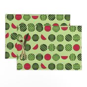 Seamless Pattern With Geometric Watermelons On Light Green Background