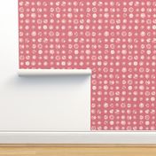 daisy polkadots in white on peach-pink