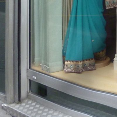 Three Saris in the Window