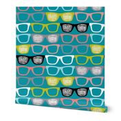 colorful glasses on teal