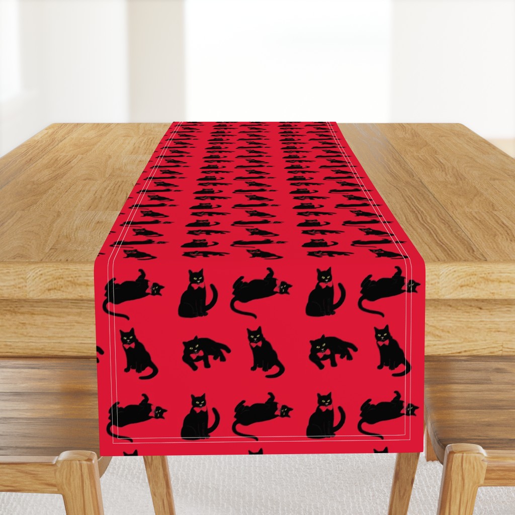 Black cats on red & no ravens because the cats ate them! ;)