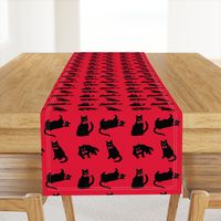 Black cats on red & no ravens because the cats ate them! ;)