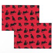 Black cats on red & no ravens because the cats ate them! ;)