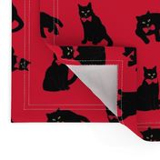 Black cats on red & no ravens because the cats ate them! ;)