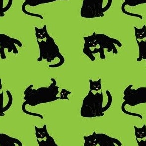 Black cats on green