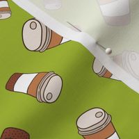 Coffee cup pattern on green background. Espresso, cappuccino or latte.
